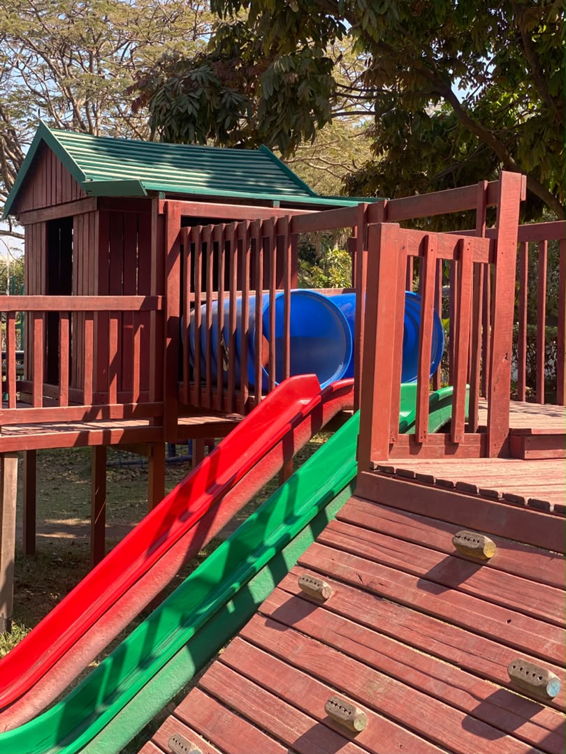 Playground tunnel and double slide at Simba International School