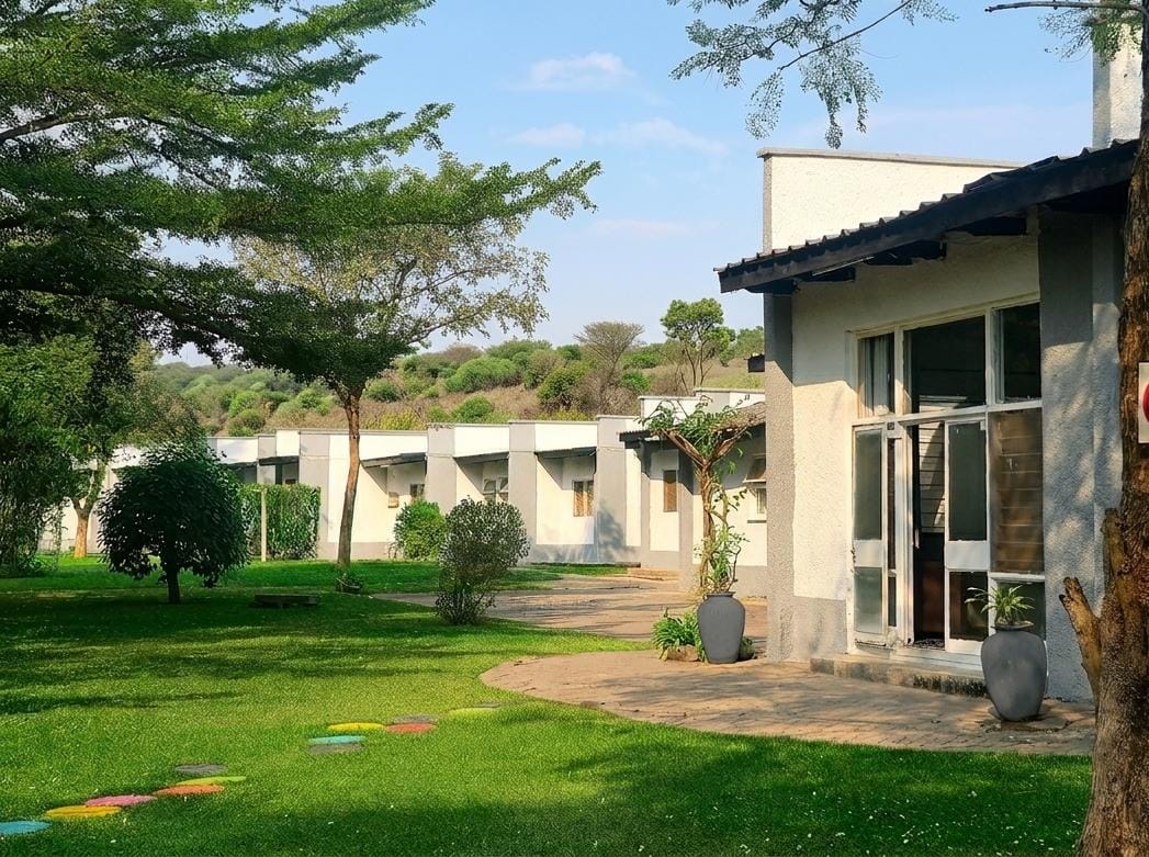 Tau House courtyard lawns and residence blocks