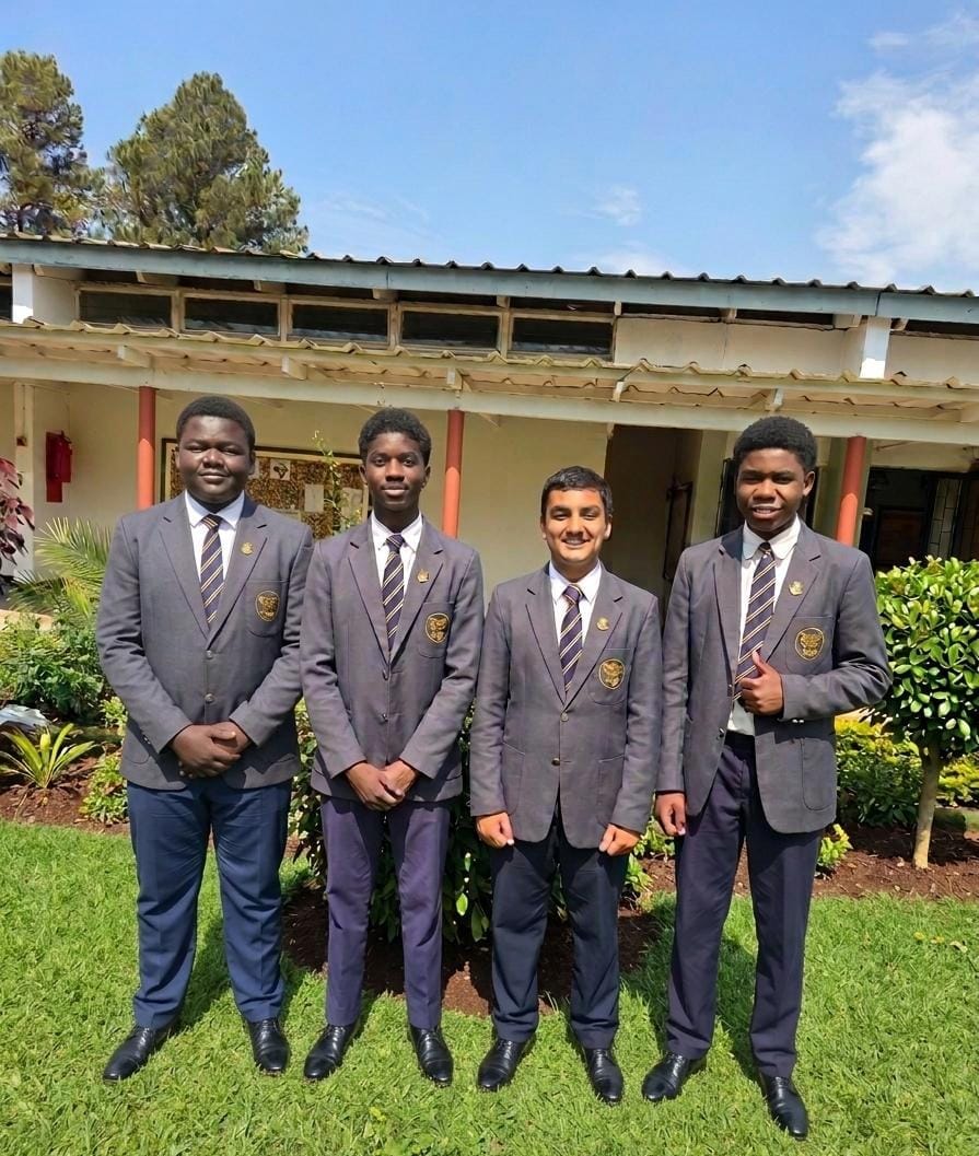 Senior boys in Simba blazers on campus